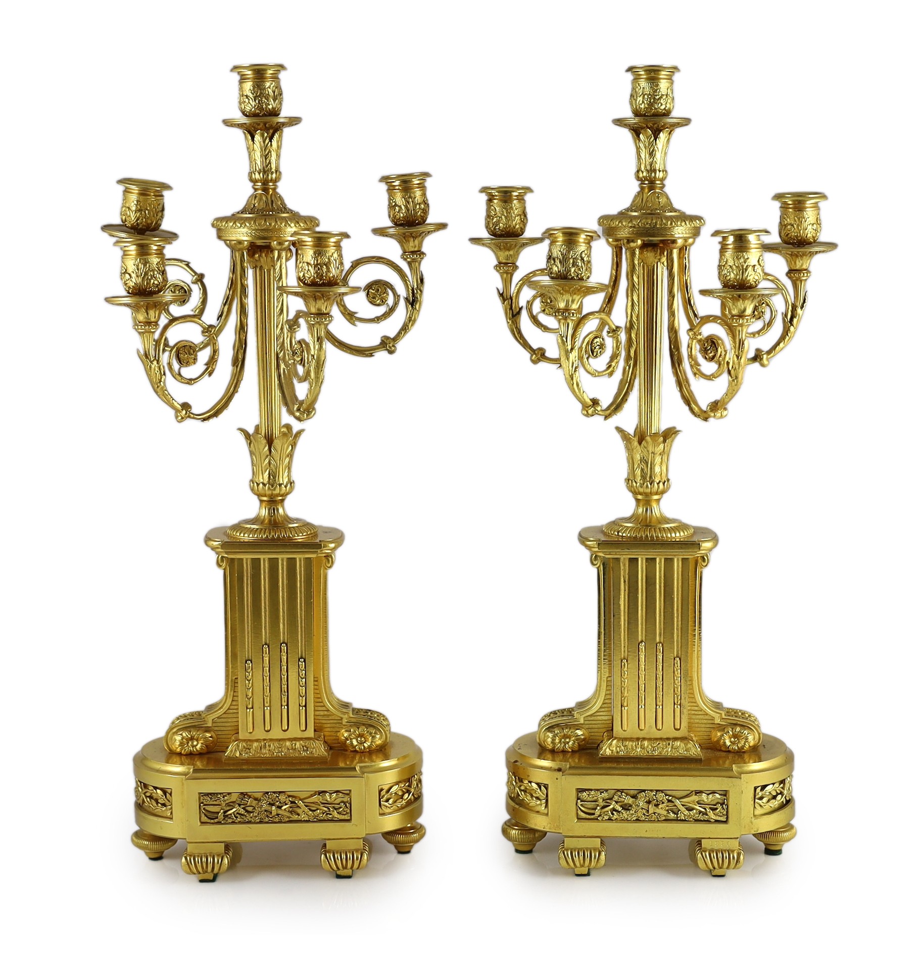 A pair of 19th century French ormolu five light candelabra, 26cm wide, 56cm high